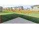 Expansive backyard showcasing lush green lawn and neighborhood views at 3650 Olive Grove Ln, Covington, GA 30016