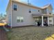 A view of the home's backyard featuring a patio, landscaping, and privacy at 3330 Deaton Trl, Buford, GA 30519