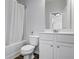 Bright bathroom with a vanity, toilet, tub, and shower, providing a functional and clean space at 3330 Deaton Trl, Buford, GA 30519