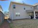 A view of the side and back of the home featuring durable siding at 3330 Deaton Trl, Buford, GA 30519