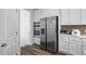 Modern kitchen with stainless steel appliances and a large double-door refrigerator at 3330 Deaton Trl, Buford, GA 30519