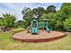 Community playground with slides and climbing features for to enjoy at 3330 Deaton Trl, Buford, GA 30519