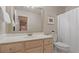 Bathroom with single vanity and shower/tub combo at 1610 River Oak Dr, Roswell, GA 30075