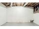 Unfinished basement with white cinderblock walls at 4412 Rustic Wood Dr, Stone Mountain, GA 30083