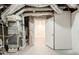 Unfinished basement area with HVAC and access to other rooms at 4412 Rustic Wood Dr, Stone Mountain, GA 30083