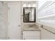 Bathroom with granite countertop, updated vanity, and mirror at 4412 Rustic Wood Dr, Stone Mountain, GA 30083