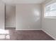 Spacious bedroom with neutral walls and carpet flooring at 4412 Rustic Wood Dr, Stone Mountain, GA 30083