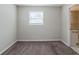 Simple bedroom with neutral walls and carpet flooring at 4412 Rustic Wood Dr, Stone Mountain, GA 30083