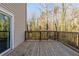 Deck overlooking wooded area, with access from sliding glass door at 4412 Rustic Wood Dr, Stone Mountain, GA 30083
