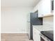 Kitchen features white cabinets, stainless steel appliances and granite countertops at 4412 Rustic Wood Dr, Stone Mountain, GA 30083