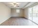 Living room with hardwood floors and sliding doors to deck at 4412 Rustic Wood Dr, Stone Mountain, GA 30083