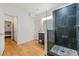 Bathroom with a large walk-in shower and modern vanity at 5964 Wolf Creek Dr, Atlanta, GA 30349