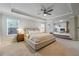 Spacious main bedroom with sitting area and large windows at 5964 Wolf Creek Dr, Atlanta, GA 30349