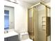 Well-lit bathroom showcasing a walk-in shower and a sleek, modern vanity at 3945 Peninsula Ct, Lawrenceville, GA 30044