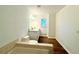 Bright bathroom with a soaking tub, double vanity, and wooden floors at 3945 Peninsula Ct, Lawrenceville, GA 30044