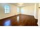 Cozy bedroom featuring hardwood floors and natural light at 3945 Peninsula Ct, Lawrenceville, GA 30044