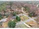 An aerial view of a neighborhood featuring tree-lined streets and well-maintained homes, showcasing community charm at 2418 Brookdale Ne Dr, Atlanta, GA 30345