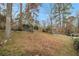 Sloped backyard with wooded area and privacy at 2418 Brookdale Ne Dr, Atlanta, GA 30345