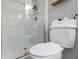 Modern bathroom features a glass enclosed shower and toilet at 2418 Brookdale Ne Dr, Atlanta, GA 30345