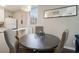 Cozy dining area adjacent to the kitchen with hardwood floors and natural light at 2418 Brookdale Ne Dr, Atlanta, GA 30345