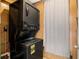 Stackable washer and dryer in a compact laundry room at 2418 Brookdale Ne Dr, Atlanta, GA 30345
