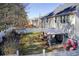 Landscaped backyard features a white fence, mature trees, and a cozy gazebo with patio seating at 3258 Kessock Ridge Trl, Snellville, GA 30039