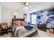 Modern bedroom with a colorful geometric wall design and plenty of space at 3258 Kessock Ridge Trl, Snellville, GA 30039