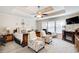 Serene main bedroom features a tray ceiling and furniture arrangement at 3258 Kessock Ridge Trl, Snellville, GA 30039