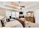 Comfortable main bedroom with a large bed, a dresser, and large windows that provide natural light at 3258 Kessock Ridge Trl, Snellville, GA 30039
