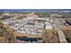 Aerial perspective showing townhomes in mixed-use community with easy access to roadways at 6750 Avis Walk, Alpharetta, GA 30005