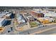 Wide aerial of mixed-use development with shops, eateries, and accessible roadways at 6750 Avis Walk, Alpharetta, GA 30005