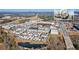 Wide aerial shot featuring townhomes in a connected community with commercial properties at 6750 Avis Walk, Alpharetta, GA 30005