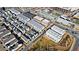 High-angle view of community featuring modern townhomes near retail, dining, and entertainment at 6750 Avis Walk, Alpharetta, GA 30005