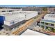 Close aerial showcasing modern commercial spaces with ample parking and well-kept landscaping at 6750 Avis Walk, Alpharetta, GA 30005