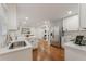 Modern kitchen features white cabinets, stainless steel appliances, and quartz countertops at 2645 Gwendon Ct, Decatur, GA 30034