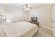 King-size bed in a finished basement bedroom with hardwood floors at 3172 Lynwood Ne Dr, Brookhaven, GA 30319