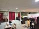 Finished basement with comfortable seating and entertainment areas at 75 Maygold St, Mcdonough, GA 30253