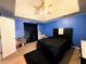 Bedroom with blue walls, carpeted floor, and ceiling fan at 75 Maygold St, Mcdonough, GA 30253