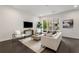 Bright living room featuring hardwood floors, comfy seating, and large windows at 241 Maynard Se Ter # 14, Atlanta, GA 30316