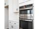 Close up view of the stainless steel oven and microwave at 726 Ocmulgee Xing, Locust Grove, GA 30248