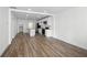 Open living room with hardwood floors and kitchen views at 1024 Herndon Nw St, Atlanta, GA 30318