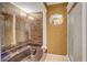 This bathroom has a soaking tub and decorative wallpaper at 5651 Bahia Mar Cir, Stone Mountain, GA 30087