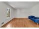 Bright living room with hardwood floors and minimal decor, with a view to the outside at 5651 Bahia Mar Cir, Stone Mountain, GA 30087