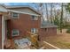 Brick home with backyard and deck at 3293 Hobart Nw Dr, Atlanta, GA 30318