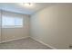 Simple bedroom with neutral decor and carpet at 3293 Hobart Nw Dr, Atlanta, GA 30318