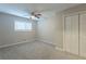 Spacious bedroom with ceiling fan and large closet at 3293 Hobart Nw Dr, Atlanta, GA 30318