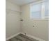 Laundry room with shelving and window at 3293 Hobart Nw Dr, Atlanta, GA 30318