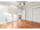 Empty bedroom boasts hardwood floors, and access to an ensuite bathroom and closet at 1015 Deckner Sw Ave, Atlanta, GA 30310