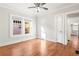 Empty bedroom features hardwood floors, base-molding, natural light, and a closet at 1015 Deckner Sw Ave, Atlanta, GA 30310
