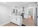 Open kitchen with quartz countertops, stainless steel appliances, subway tile, and breakfast bar at 1015 Deckner Sw Ave, Atlanta, GA 30310